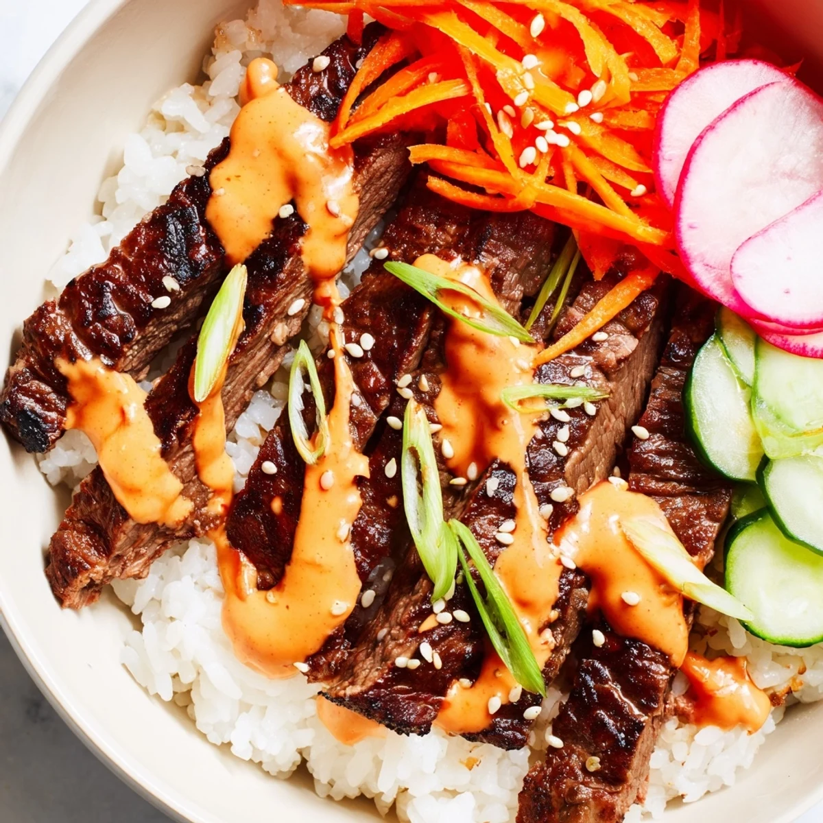 Vibrant rice bowl featuring tender Korean BBQ meat colorful veggie toppings and a generous swirl of heat tempered sauce